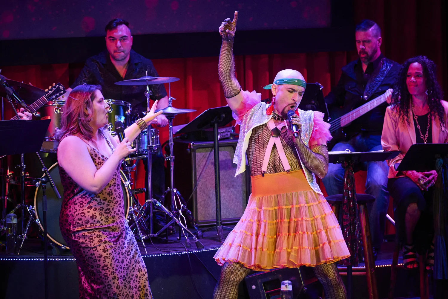 Jerreme Rodriguez and a fellow performer singing together at The Bash