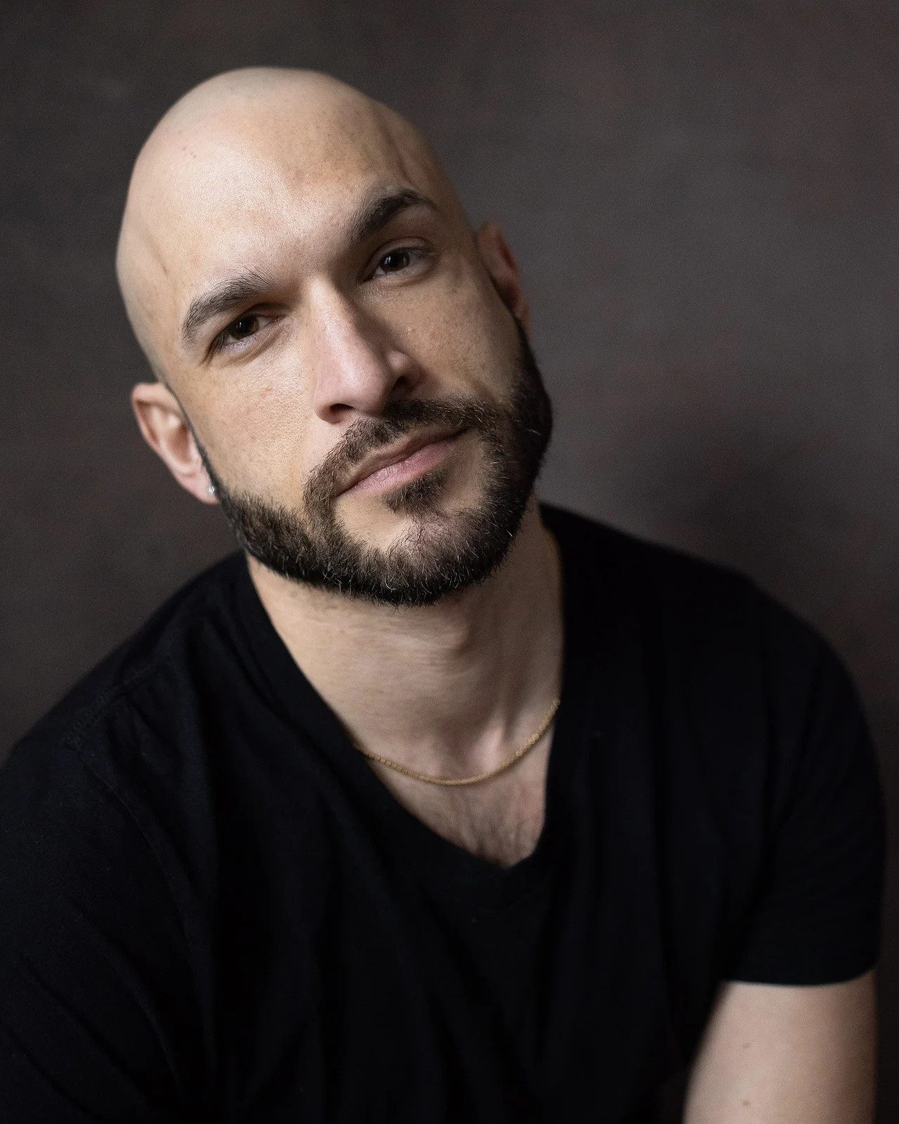 Jerreme Rodriguez in a black T-shirt, photographed by Jason Snyder